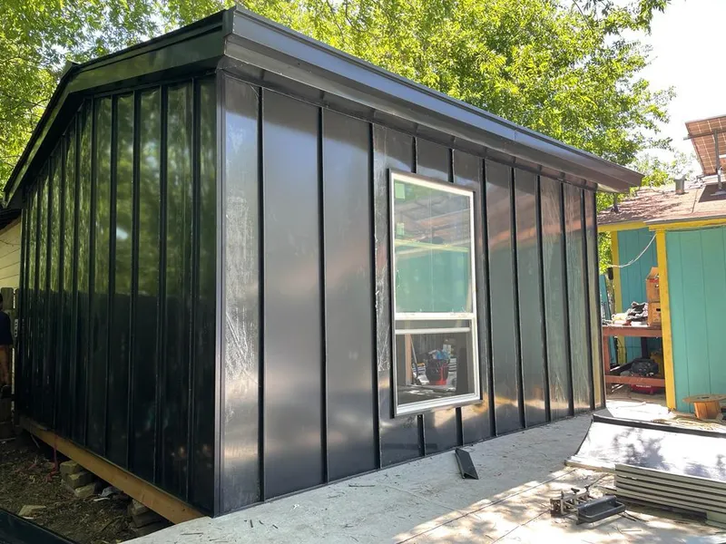 Black standing seam metal wall panels for Roof Inspection in New Port Richey